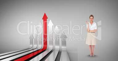 Digital composite image of businesswoman with arrow signs