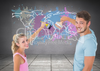 Couple painting a Colorful Map with paint splattered wall background