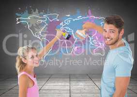 Couple painting a Colorful Map with paint splattered wall background