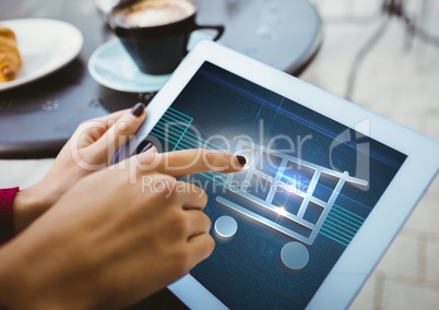 Person using Tablet with Shopping trolley icon