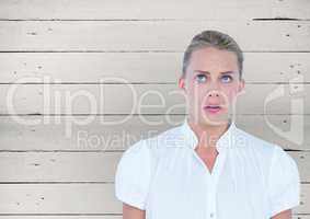 Scared business woman. white wood background