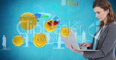 Digital composite image of businesswoman using laptop by various emojis