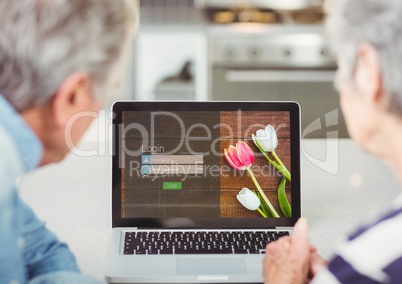 In the kitchen with the laptop. Login screen