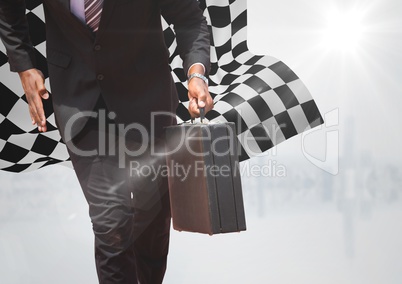 Business man lower body with briefcase against white skyline and checkered flag