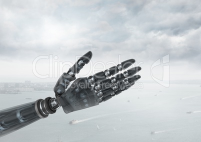 Android Robot hand open with bright sky background