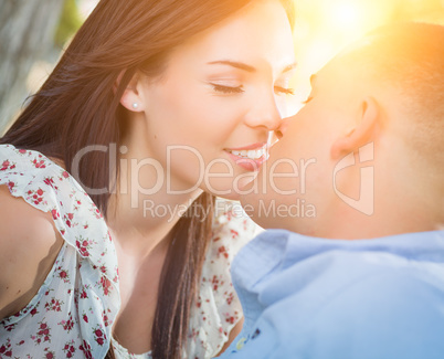 Happy Mixed Race Romantic Couple Portrait in the Park.