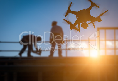 Silhouette of Unmanned Aircraft System (UAV) Quadcopter Drone In