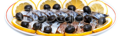 Herring lemons and black olives