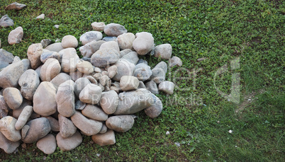 heap of stones on the grass