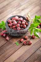 Dog rose or rosehip berries with leaves, dried briar