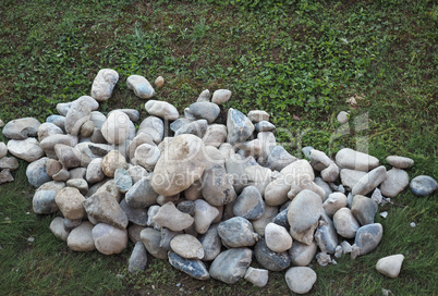 heap of stones on the grass