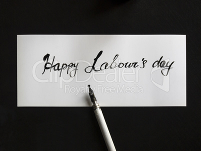Happy labour's day calligraphy and lattering post card. Top View with calligraph.