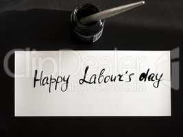 Happy labour's day calligraphy and lattering post card. Top View with calligraph in ink tank