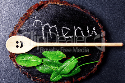 wooden background with an inscription of the menu