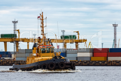 Tug ship in cargo port