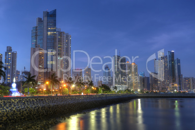 Panama City skyline and Bay of Panama, Central America in the tw