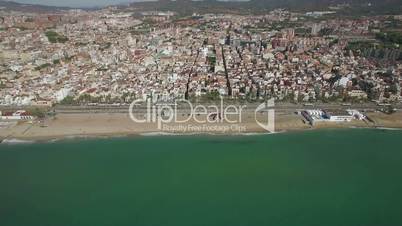 Aerial panorama of Barcelona with coast, Spain