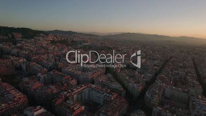 Aerial cityscape of Barcelona at sunset