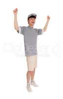 Happy Asian man with arms raised.