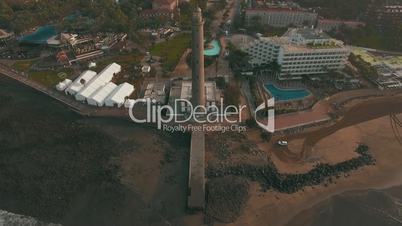 Aerial scene of Gran Canaria tourist town with Maspalomas Lighthouse