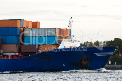 Blue container ship's bow