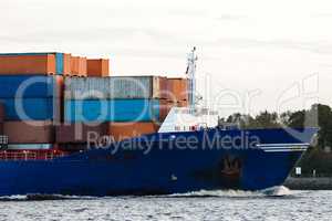 Blue container ship's bow