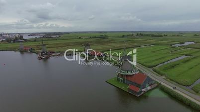 Windmills and fields in Dutch village, aerial view