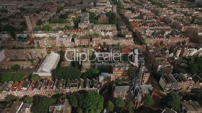 Aerial shot of Amsterdam with houses and Volden Church