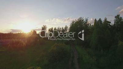 Aerial scene of village with railway at sunset, Russia