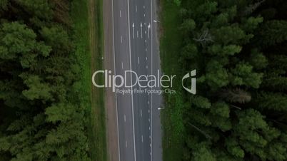 Aerial shot of transport traffic on countryside road