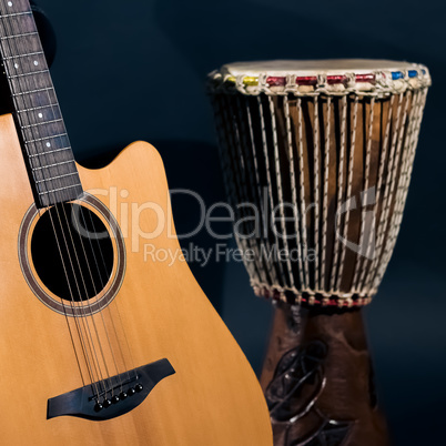 Acoustic guitar with percussion drum