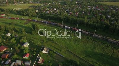 Cargo trains traveling in the countryside, Russia