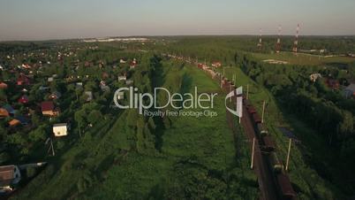 Cargo trains moving through the village, aerial view