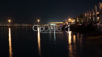 Timelapse shot of people in night tourist town