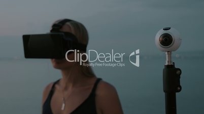 360 degree camera and woman with VR glasses
