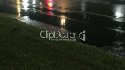 Traffic in the city at rainy night