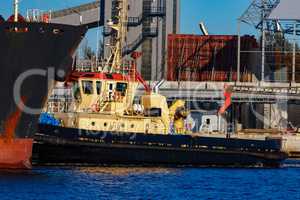 Black cargo ship mooring