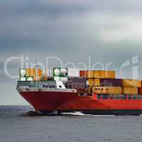 Red cargo container ship