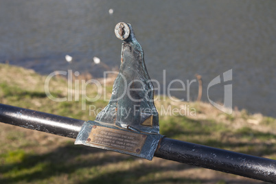 Mini metal sculpture of orientation compas as sport symbol photo in Uzhgorod Ukraine