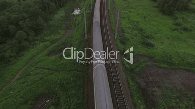 Aerial bird eye view of two railway different direction and moving trains, Russia