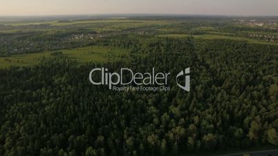 Aerial flight above the huge green forest, Russia
