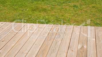 Wooden deck with grass