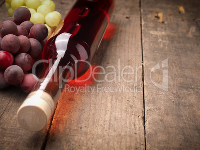 Bottle of wine on wooden table