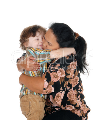 Nanny hugging the little boy.