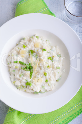 Risotto with Asparagus in a white plate