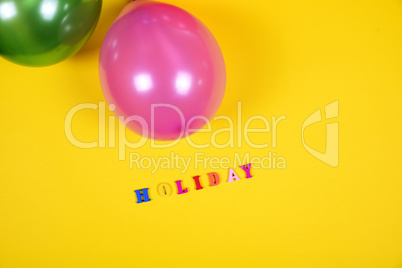 Balloon and inscription holiday