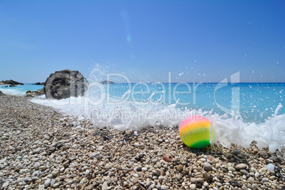 Colorful ball on a beach