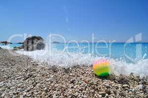 Colorful ball on a beach