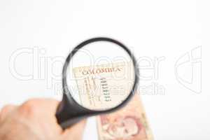 Magnifying Glass on the Colombian Pesos.