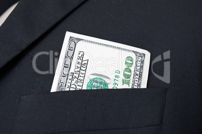 United States dollar (USD) bills - in businessman suit pocket